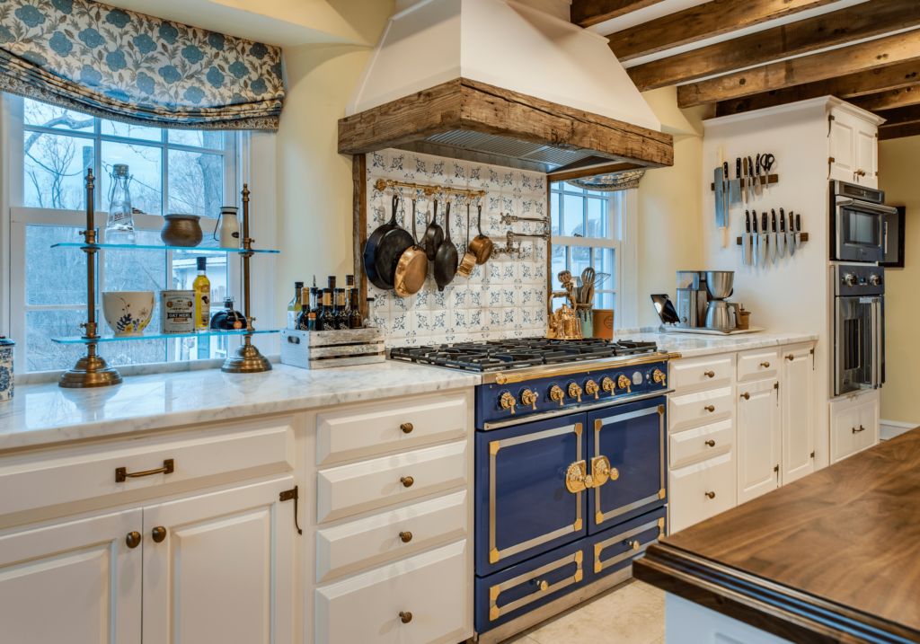 Rosenberg Kitchen. Vintage style kitchen with blue stove and decorative tiles.